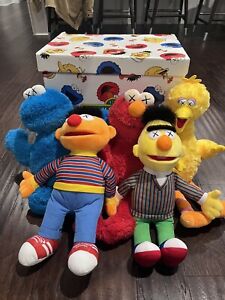 Kaws X Sesame Street Plush Collection. 3 Used, 2 New.