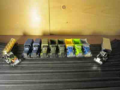 10 Custom TYCO US1 Peterbilts on TCR Jam Chassis with guide pins.