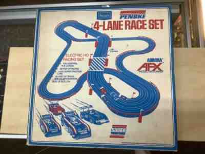 Aurora AFX Sears Penske 4-Lane electric Ho race set-preowned open but never used