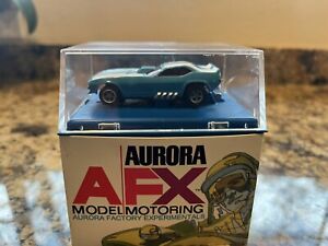 New ListingAurora AFX White/Blue Cuda Funny Car With Wheelie Bar.