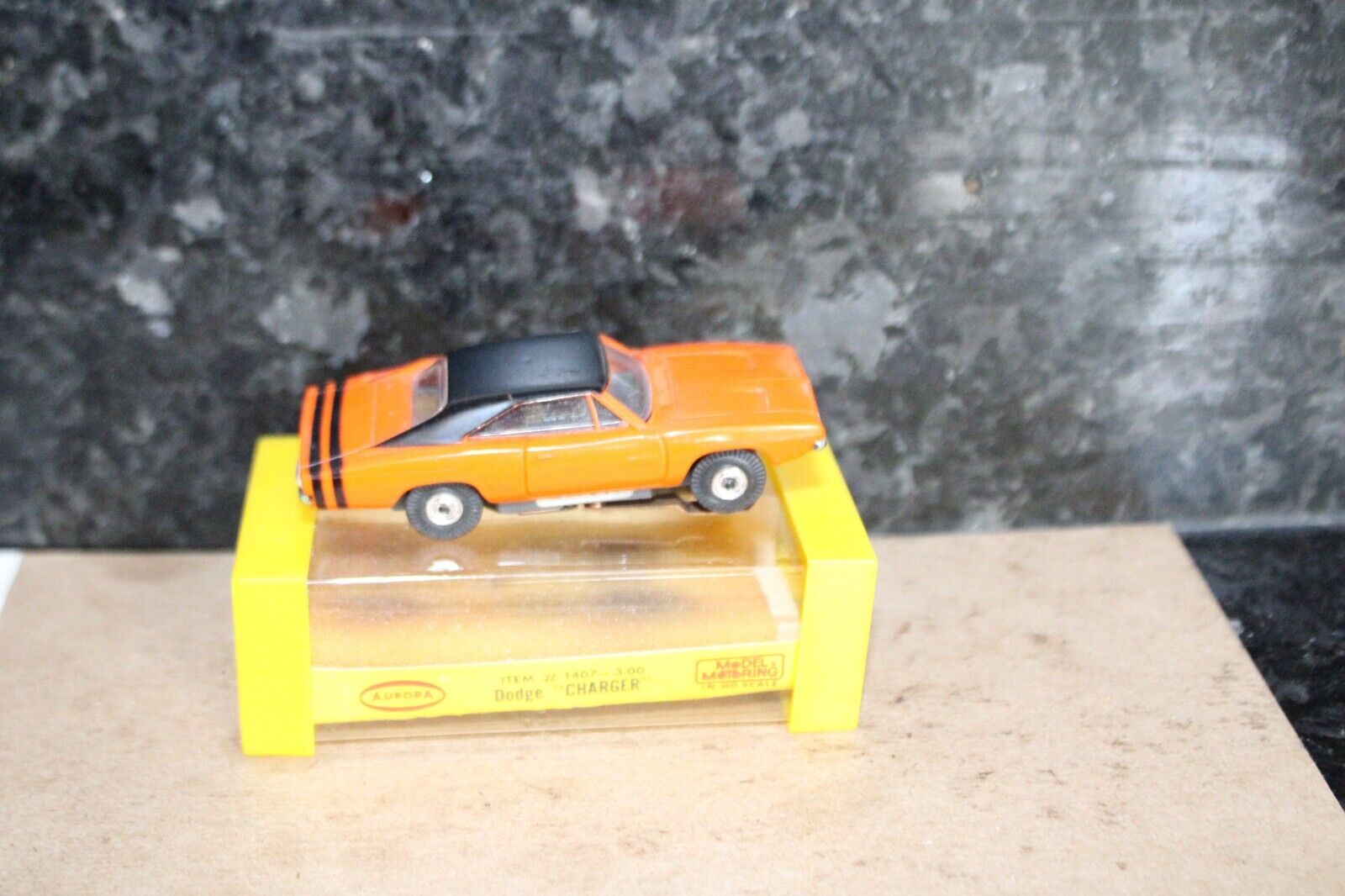 AURORA TJET SUPER RARE DODGE CHARGER IN ORANGE IN ORIGINAL CUBE WITH LABEL! !