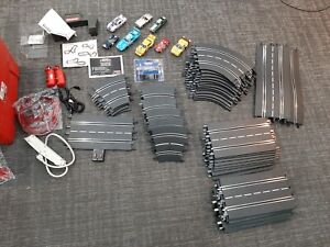 carrera 1/24 slot car track set, many extra parts and cars, no box