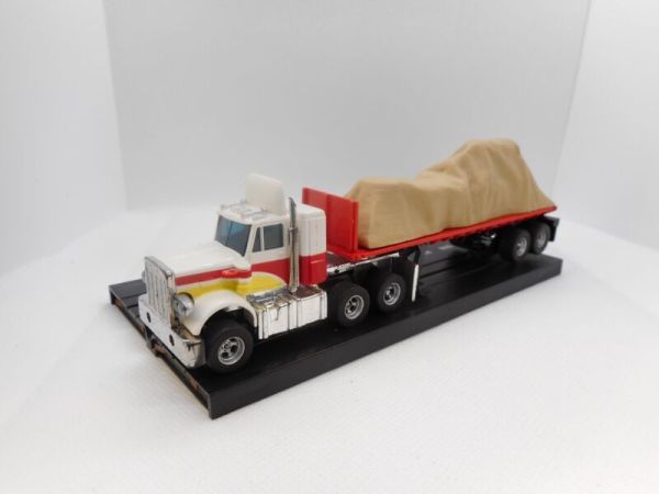 AURORA AFX PETERBUILT WITH TRAILER, LIGHTED MAGNATRACTION