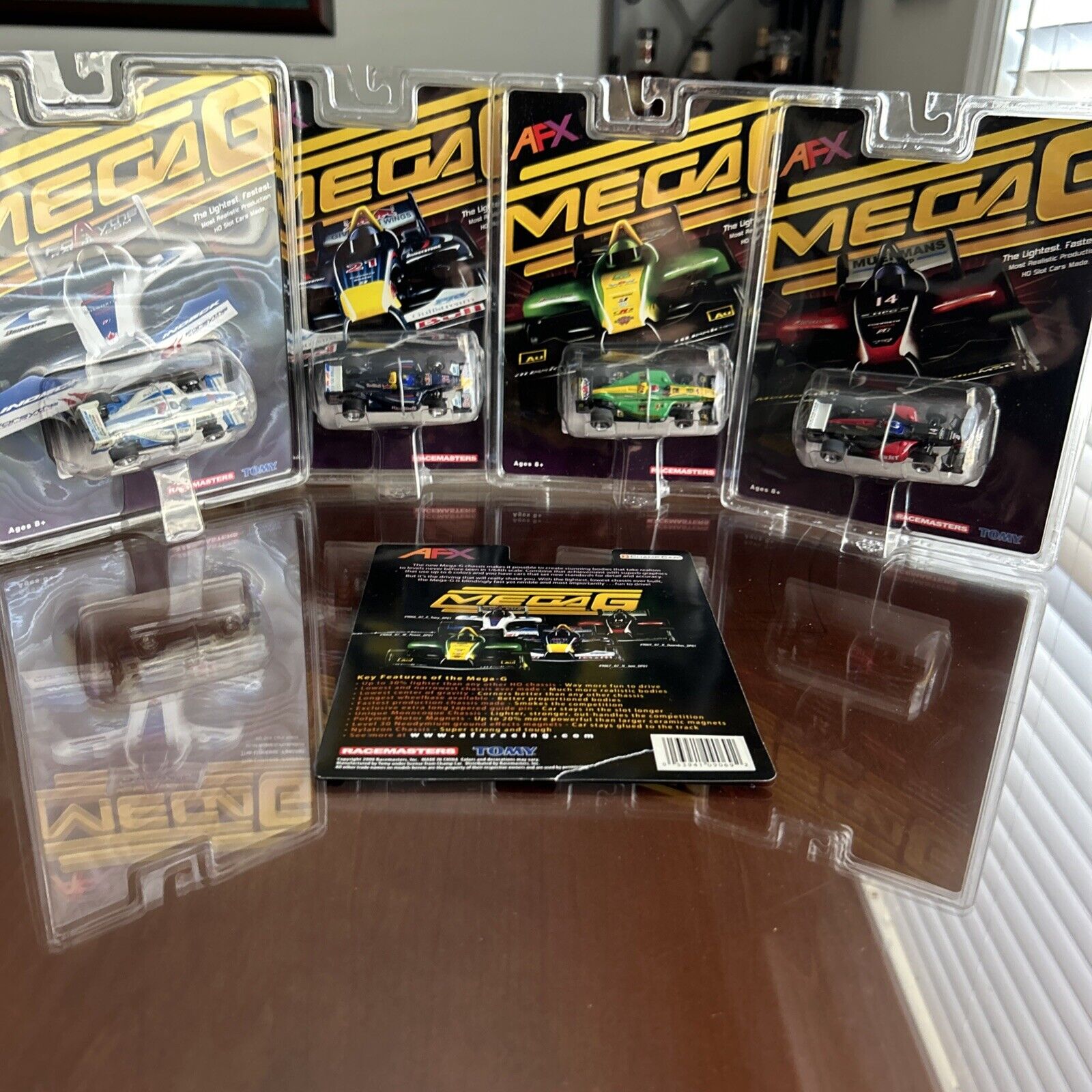 AFX Mega G Champ Cars All 4 Brand New (NOS) Sealed Excellent Condition.