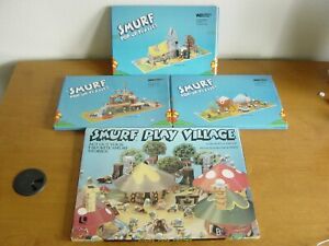 1981 Smurf Play Village & 1983 Smurf Pop Up Playsets x3. Unused. Hard to find.