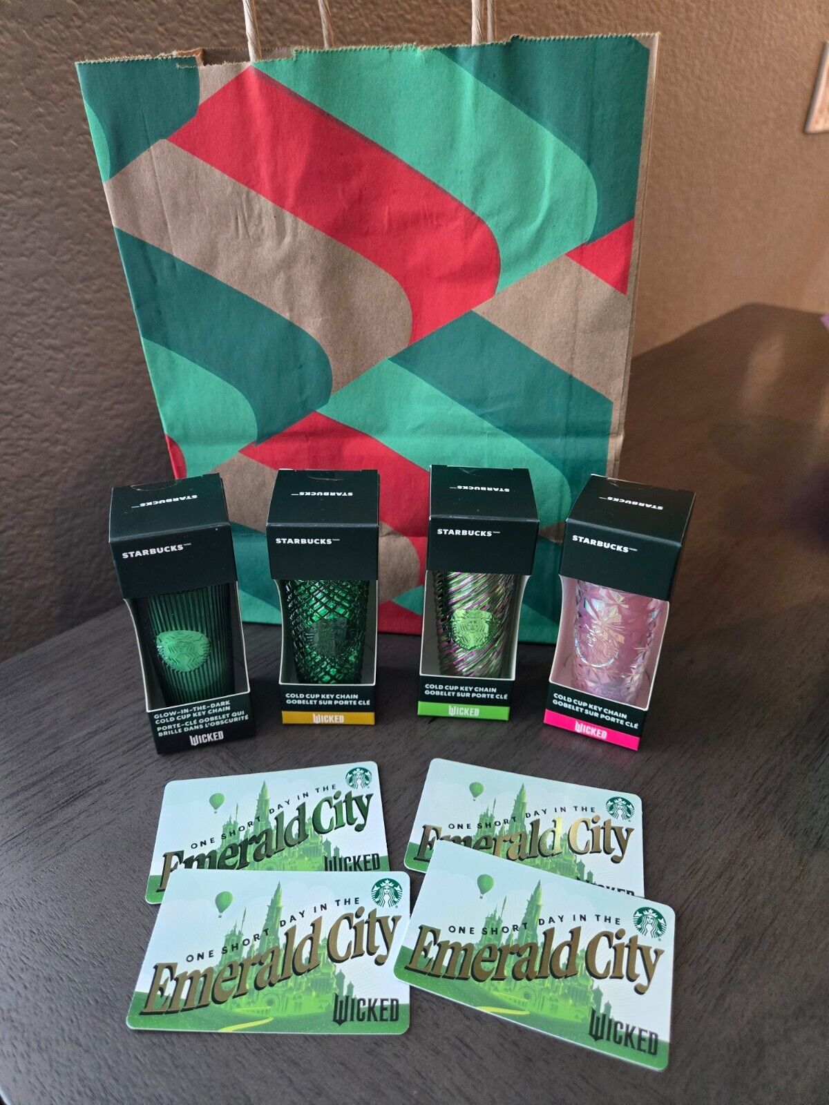 Starbucks NWT Wicked Keychain Set of 4 Elphaba Glinda Emerald City & Swirl +4GC! - Sold on eBay December 29th, 2024 for $71.00 (3 bids) 