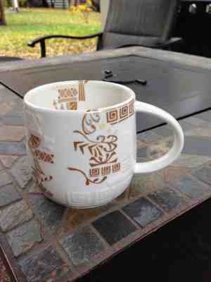 Starbucks 2012 Coffee Mug New Bone China Embossed Aztec Ivory & Gold 14 Fl. Oz. - Sold on eBay Nov, 10th 2018 for $7.99