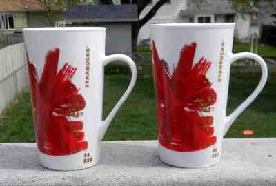 2 NEW STARBUCKS COFFEE CERAMIC MUGS 2014 CHRISTMAS 16 OZ RED & GOLD - Sold on eBay Nov, 11th 2018 for $32.95