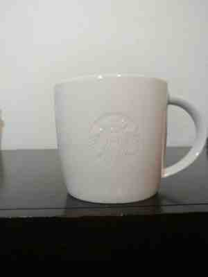 STARBUCKS 2010 White Vintage Grande Mug Pair Embossed Siren Mermaid Logo - Sold on eBay Nov, 5th 2018 for $10.00