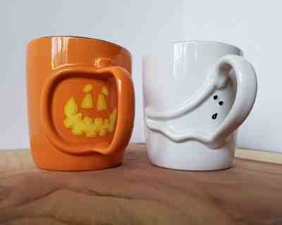 2 Starbucks Mugs White Boo Ghost  & Orange Pumpkin Halloween 2003 - Sold on eBay Oct, 2nd 2018 for $15.00