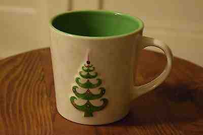 Starbucks Holiday 2006 Coffee Mug Cup Christmas Tree Embossed Relief 17 Oz. - Sold on eBay Nov, 20th 2018 for $10.00