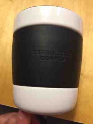 Starbucks 2009 Black Rubber Sleeve No Handle 12 Oz  Ceramic Mug Coffee Tea  - Sold on eBay Nov, 21st 2018 for $13.80
