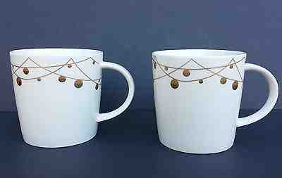 Lot of 2 - Starbucks 2012 Holiday Mugs w Gold Ornament Balls, white  - Sold on eBay Nov, 23rd 2018 for $10.00