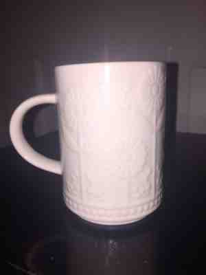 New Starbucks White Embossed Textured Daisy Flowers 12 oz Ceramic Cup Mug 2017 - Sold on eBay Nov, 19th 2018 for $9.99