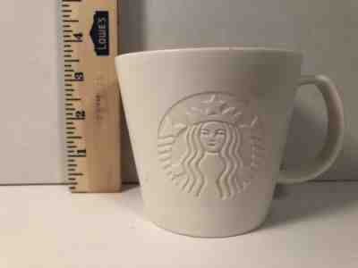STARBUCKS Coffee Mug 2015 Solid White Etched Embossed Siren Mermaid Logo 12 oz - Sold on eBay Nov, 25th 2018 for $9.00