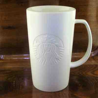 2015 Tall Starbucks White Embossed Siren Logo Coffee Mug 16 oz - Sold on eBay Nov, 24th 2018 for $16.46