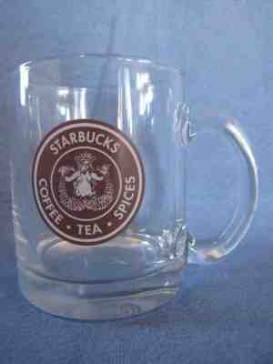 STARBUCKS 2008 COFFEE, TEA, SPICES CLEAR GLASS BROWN SPLIT TAIL MERMAID MUG - Sold on eBay Nov, 26th 2018 for $19.95