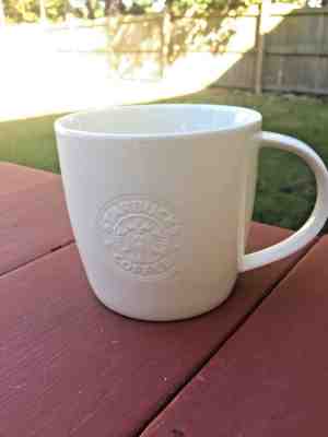 Starbucks 2009 Coffee Mug White Bone China Embossed Mermaid Logo 16 Oz - Sold on eBay Nov, 27th 2018 for $14.00