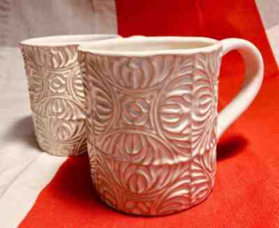 SET of 2 Starbucks Coffee Mugs Tan Cream Embossed Hand Painted Texture 14oz 2009 - Sold on eBay Dec, 1st 2018 for $26.50