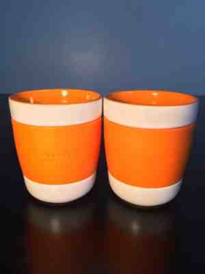 Set of 2 Starbucks 2009 Orange White Ceramic 12 oz Cup Mug Rubber Grip No Handle - Sold on eBay Nov, 28th 2018 for $19.99