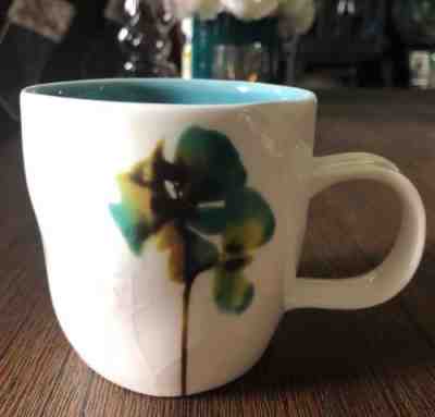 Starbucks Coffee Mug New Bone China 2009 Embossed Water Color Floral Blue Inside - Sold on eBay Dec, 11th 2018 for $10.00
