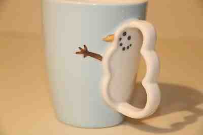 STARBUCKS 2005 PALE / SKY BLUE MUG WITH RAISED SNOWMAN AND SNOWMAN-SHAPED HANDLE - Sold on eBay Feb, 9th 2019 for $14.00