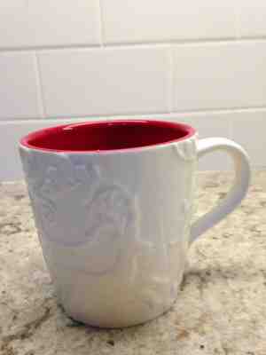 Starbucks 2009 New Bone China Coffee Mug Embossed Design Red Inside 12 Oz. - Sold on eBay Apr, 23rd 2019 for $8.99