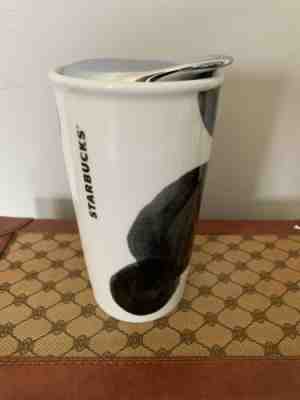 2014 Starbucks Coffee Mug With White Backdrop And Black Spots With A Metal Lid - Sold on eBay May, 12th 2019 for $4.60