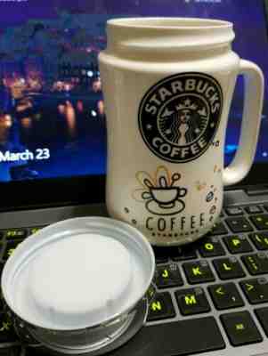 NEW Starbucks Coffee Ceramic Travel Mug With Top Cover -Black Starbucks Logo - Sold on eBay May, 12th 2019 for $22.88