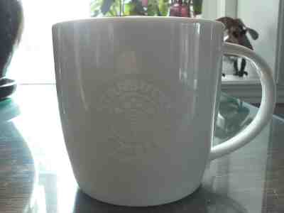 STARBUCKS White Mug Embossed Siren Mermaid Logo 2009 Bone China - Sold on eBay Feb, 16th 2019 for $17.99