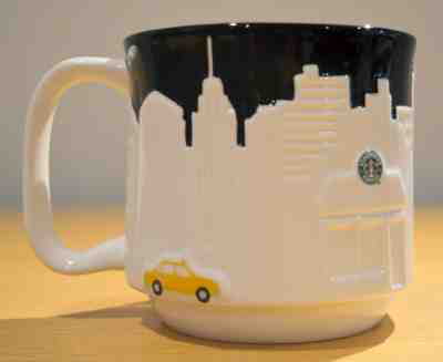 2010 STARBUCKS "NYC" New York City 3D Embossed Barrel Coffee Mug (White) 18 oz. - Sold on eBay May, 11th 2019 for $15.99