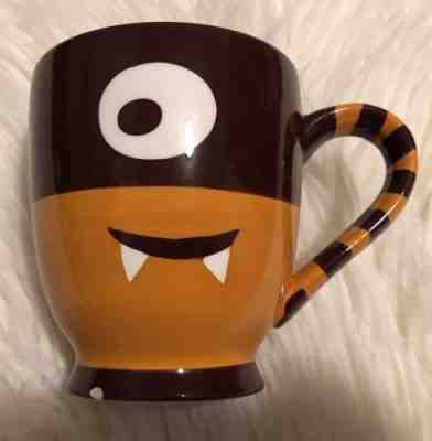 2006 Starbucks Monster Halloween Mug - Orange Brown Cyclops - Sold on eBay May, 10th 2019 for $20.99
