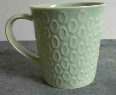 Starbucks 2010 green 14 oz.coffee Mug By Design House Stockholm embossed Ovals - Sold on eBay May, 15th 2019 for $12.00