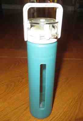 STARBUCKS Coffee TURQUOISE/Aqua 16 oz GLASS Water Bottle w/ SILICONE SLEEVE 2010 - Sold on eBay May, 12th 2019 for $12.74