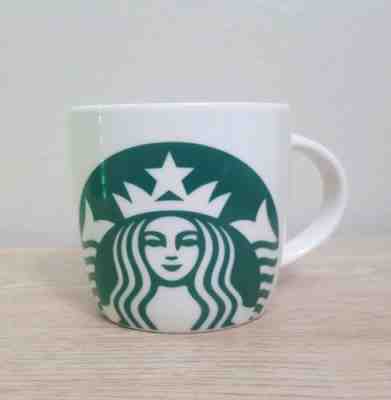 STARBUCKS Coffee Mug White and Green MERMAID Logo Icon 14 Oz. 2017 - Sold on eBay May, 31st 2019 for $19.00