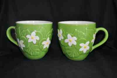 Starbucks 2006 Coffee Mugs Set of 2  embossed green leaves & white Daisy flower - Sold on eBay Jul, 7th 2019 for $19.99