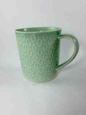 STARBUCKS 2010 14 OZ MUG - DESIGN HOUSE STOCKHOLM - GREEN EMBOSSED OVALS  - Sold on eBay Oct, 21st 2019 for $23.99