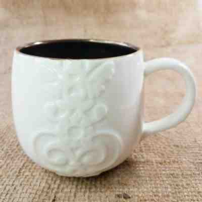 Starbucks Casi Cielo Mug White Floral Embossed Copper Bronze 12 oz 355 mL 2013  - Sold on eBay Oct, 20th 2019 for $16.44