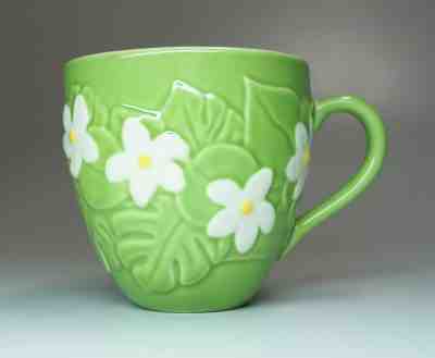 Starbucks Coffee 2006 Mug Cup Bright Green Bas Relief White Tropical Flowers EUC