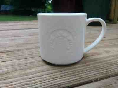 Starbucks We Proudly Serve Mermaid Logo White Coffee Cup Mug Embossed 3D NEW - Sold on eBay Nov, 6th 2019 for $19.50