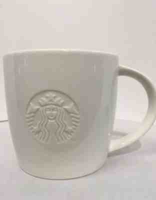 STARBUCKS 2010 WHITE PORCELAIN COFFEE CUP MUG SHORT EMBOSSED MERMAID LOGO - Sold on eBay Nov, 15th 2019 for $15.99