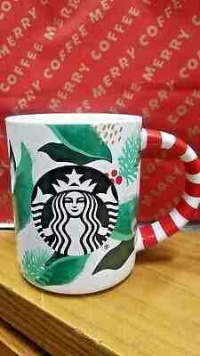 NEW 12 oz 2019 Starbucks Christmas Holly Leaf mug with candy cane handle - Sold on eBay Nov, 14th 2019 for $22.99