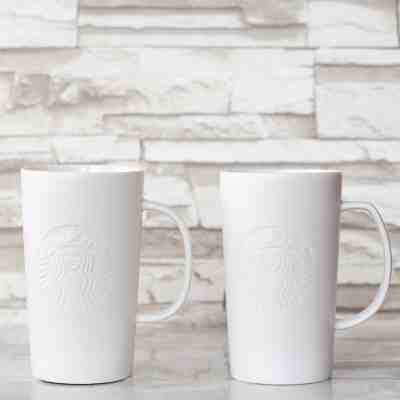 Set of 2 Starbucks Mugs White Embossed 16 oz Grande - Sold on eBay Nov, 8th 2019 for $23.95
