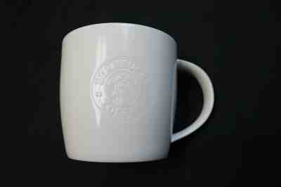 STARBUCKS COFFEE - 2009 White New Bone China Embossed Siren Logo 16oz Cup Mug - Sold on eBay Nov, 17th 2019 for $19.99