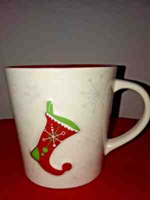 Starbucks Ivory Snowflake Mug 17 Ounces, embossed Stocking Red Interior 2006 - Sold on eBay Nov, 20th 2019 for $20.00