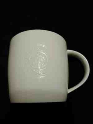 STARBUCKS 2009 Siren Embossed White New Bone China Ceramic 16oz coffee mug cup - Sold on eBay Nov, 22nd 2019 for $15.00