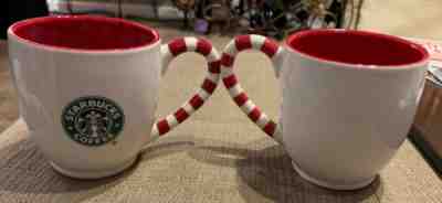 2010 Starbucks Christmas Holiday Mug.  Candy Cane Handle Red/White X2 - Sold on eBay Dec, 3rd 2019 for $15.95