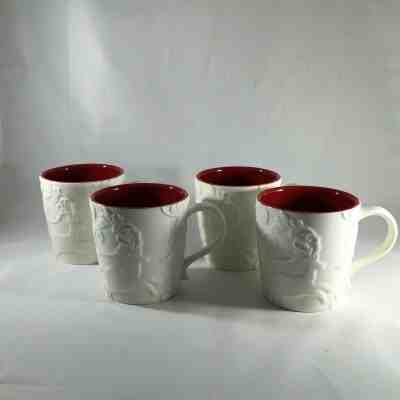 Starbucks Embossed White Reindeer Coffee Mugs Cups Set of 4 Bone China 2009 12Oz - Sold on eBay Dec, 4th 2019 for $34.97