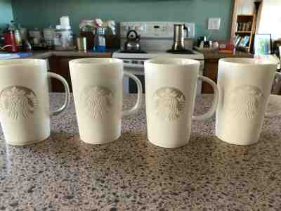 Starbucks Ceramic 16 Oz Coffee Mug 2014 White On White Embossed Siren Logo - Sold on eBay Dec, 13th 2019 for $40.00