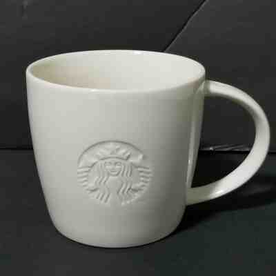 Starbucks White Embossed T Mug Tall 12 oz 2010 Excellent Used Condition - Sold on eBay Jan, 5th 2020 for $21.99